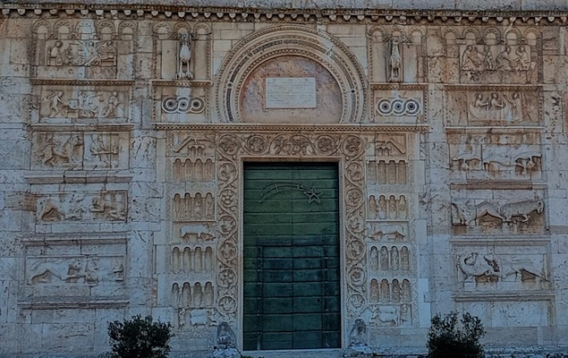 The central portal reliefs