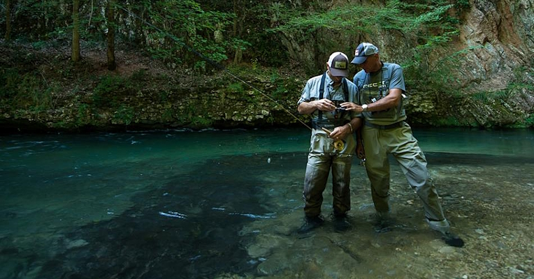 Two anglers sport fishing in the no-kill sections of the Nera River