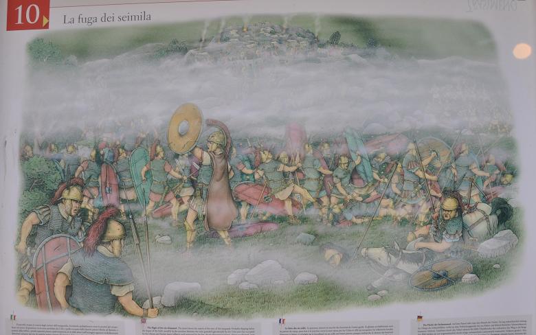  Illustrazione della battaglia del Trasimeno, che cattura il momento drammatico dello scontro tra le truppe di Annibale e quelle romane, evidenziando il caos e l'intensità del conflitto storico. 