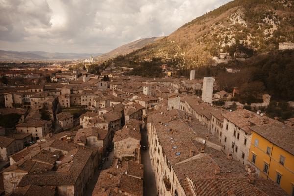 Aerial view of the town of Gubbio with Monte Ingino in the background.