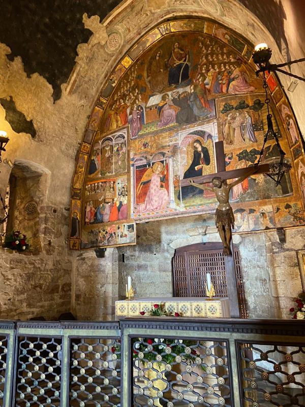 Altar with crucifix, frescoed walls inside the Portiuncula in the Basilica of Santa Maria degli Angeli